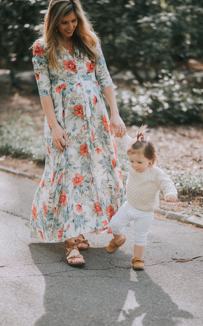 This blogger is 27 weeks with baby number three! Come check out her easy maternity style in this floral maxi dress!