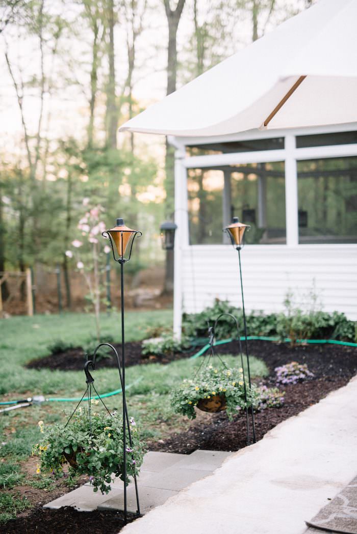 Come check out this Patio update on a budget! You don't need to spend thousands of dollars to update your outdoor space! A beautiful dogwood tree really creates a beautiful landscape!